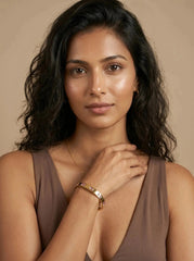 Gold bangle set with pink baguette cut zircon stones — view 2
