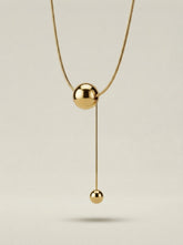 Gold Titanium Steel Dual Sphere Pendant Necklace