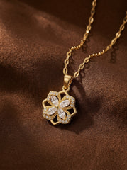 Four-Leaf Clover Necklace in 18K Gold with Rotating Clover & Zircon