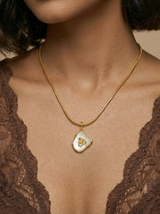 Gold Titanium Steel & Mother-of-Pearl Flower Pendant Necklace
