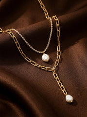 Gold Multi-Layered Tassel Necklace with Faux Pearl Drop