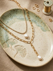 Gold Multi-Layered Tassel Necklace with Faux Pearl Drop