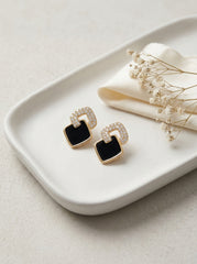 Gold Alloy Drop Earrings with Rhinestone Knot and Dark Square Accent