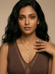 Four-Leaf Clover Necklace in 18K Gold with Rotating Clover & Zircon