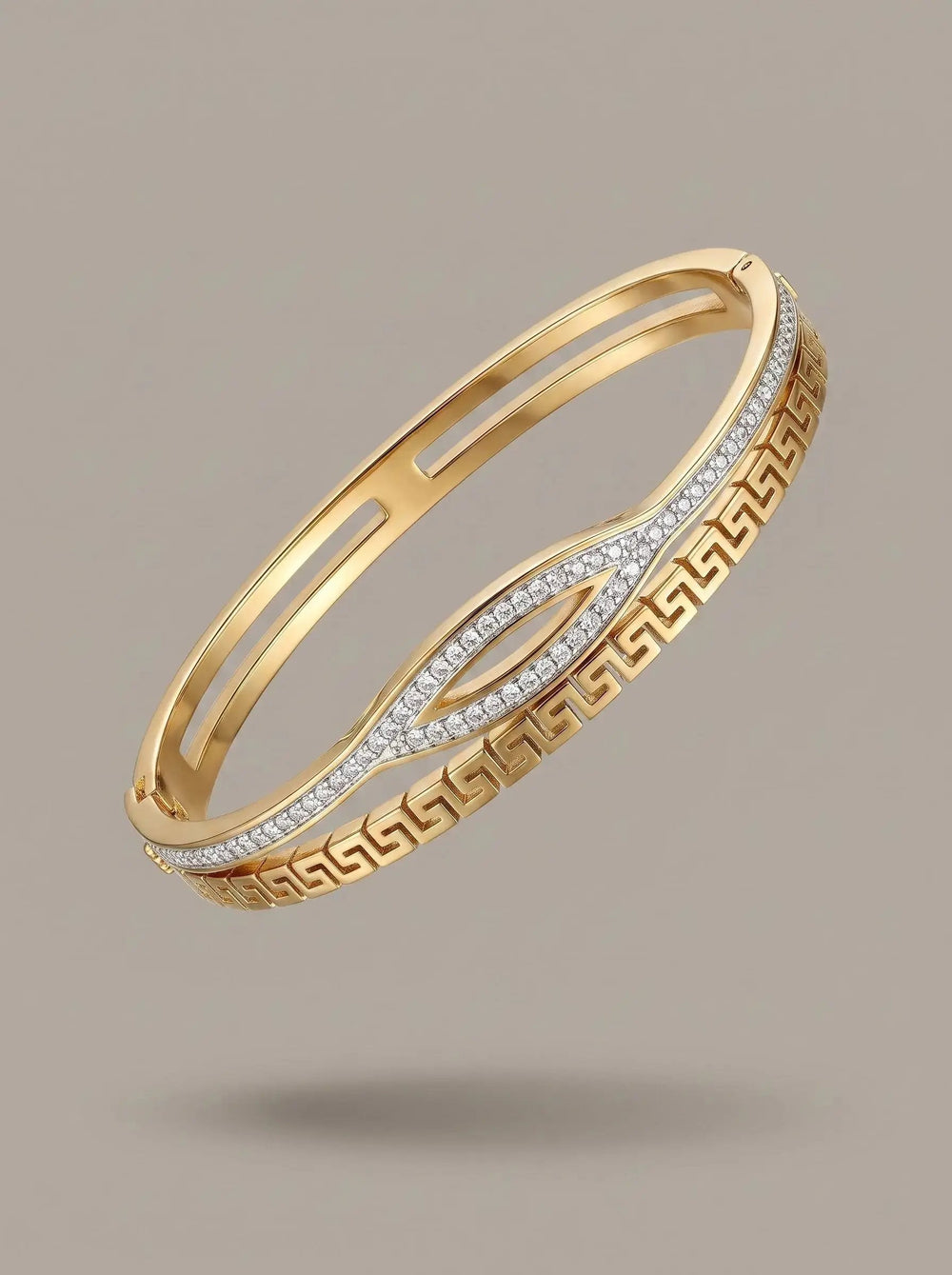Gold Greek key bangle with pave zircon marquise centre