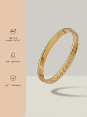 Gold bangle with clear zircons in rhombus shaped settings — view 4
