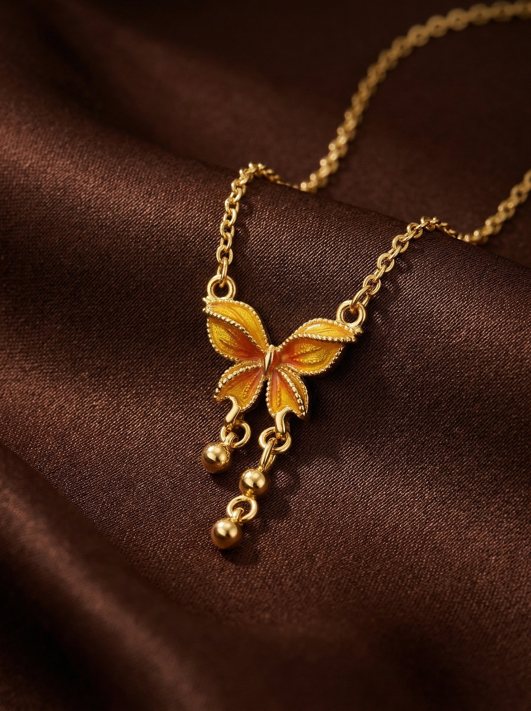 Dream Butterfly Necklace in Gold-Tone Titanium Steel with Orange Accents