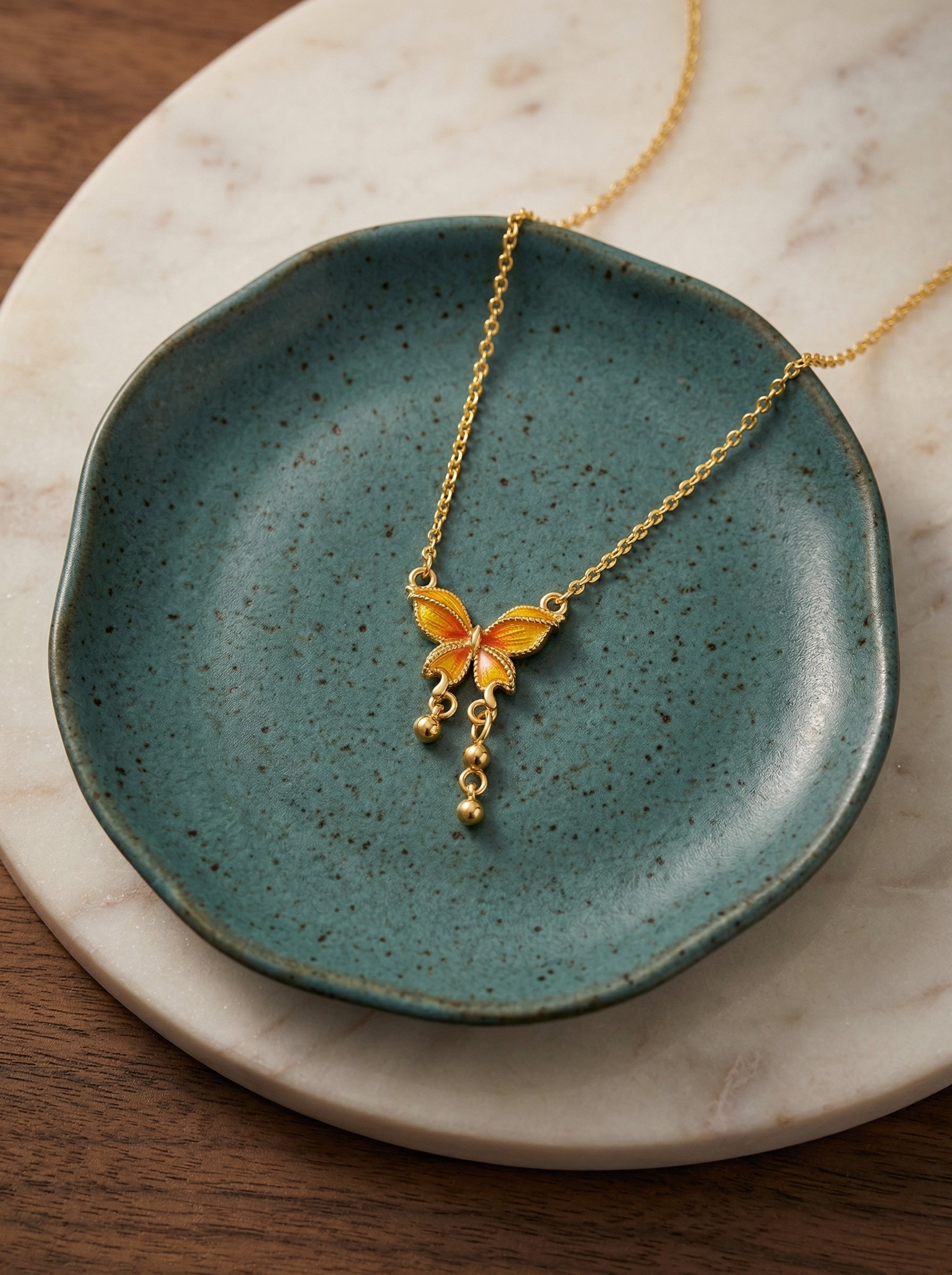 Dream Butterfly Necklace in Gold-Tone Titanium Steel with Orange Accents