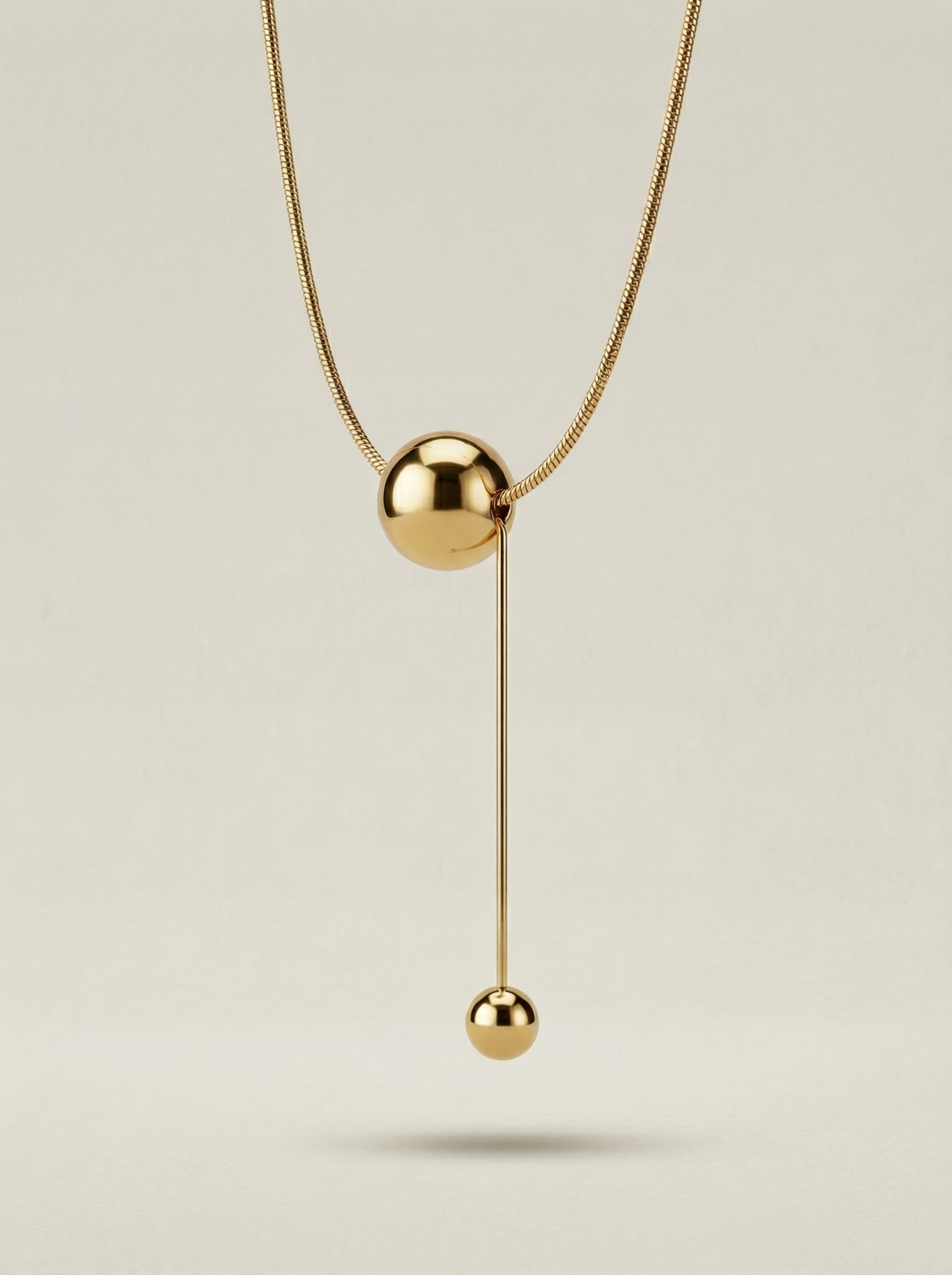 Gold Titanium Steel Dual Sphere Pendant Necklace