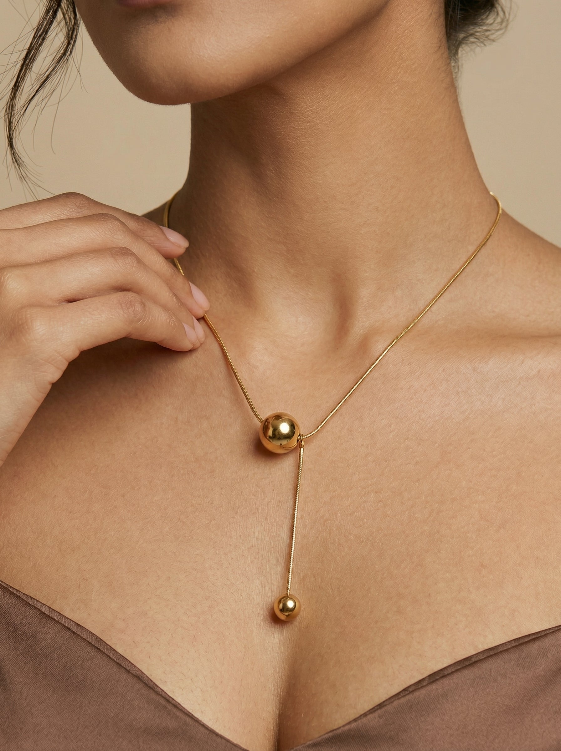 Gold Titanium Steel Dual Sphere Pendant Necklace