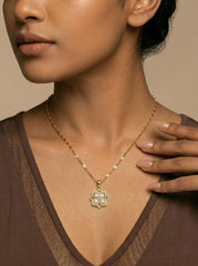 Four-Leaf Clover Necklace in 18K Gold with Rotating Clover & Zircon