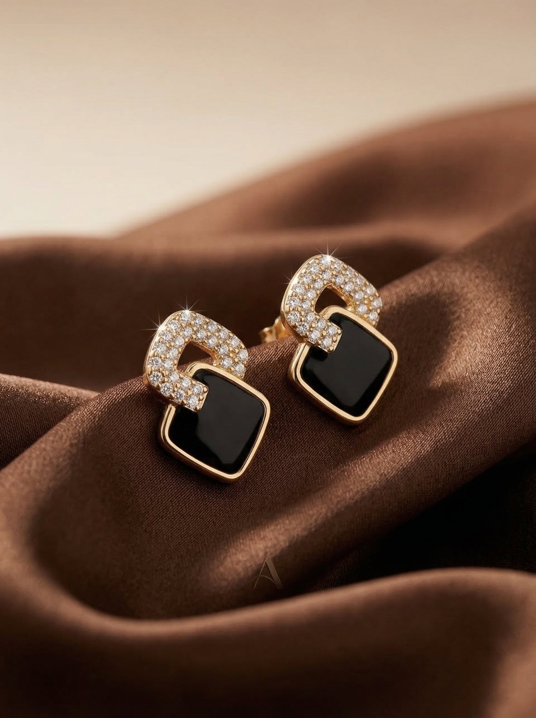 Gold Alloy Drop Earrings with Rhinestone Knot and Dark Square Accent