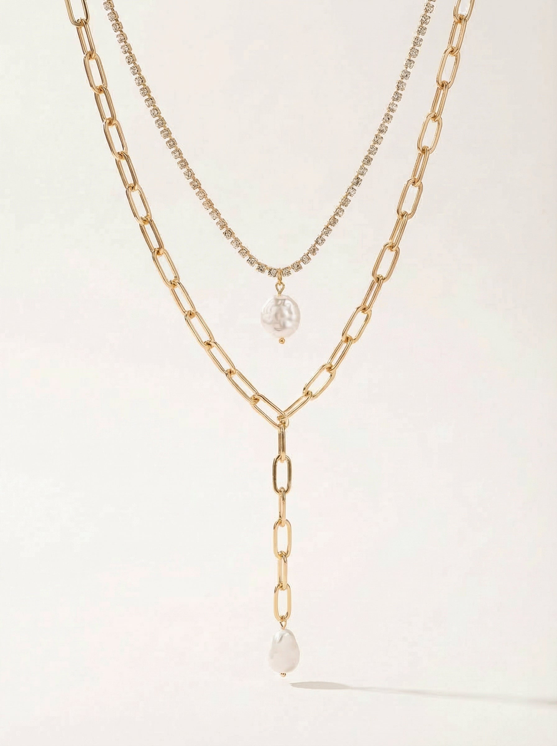 Gold Multi-Layered Tassel Necklace with Faux Pearl Drop