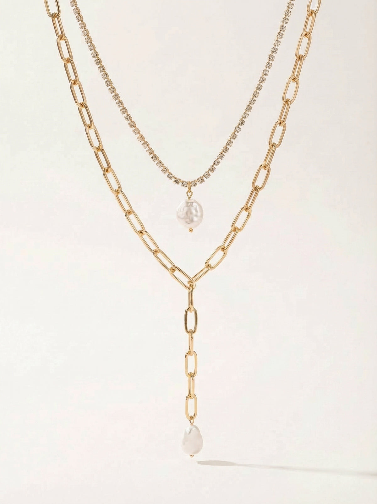 Gold Multi-Layered Tassel Necklace with Faux Pearl Drop